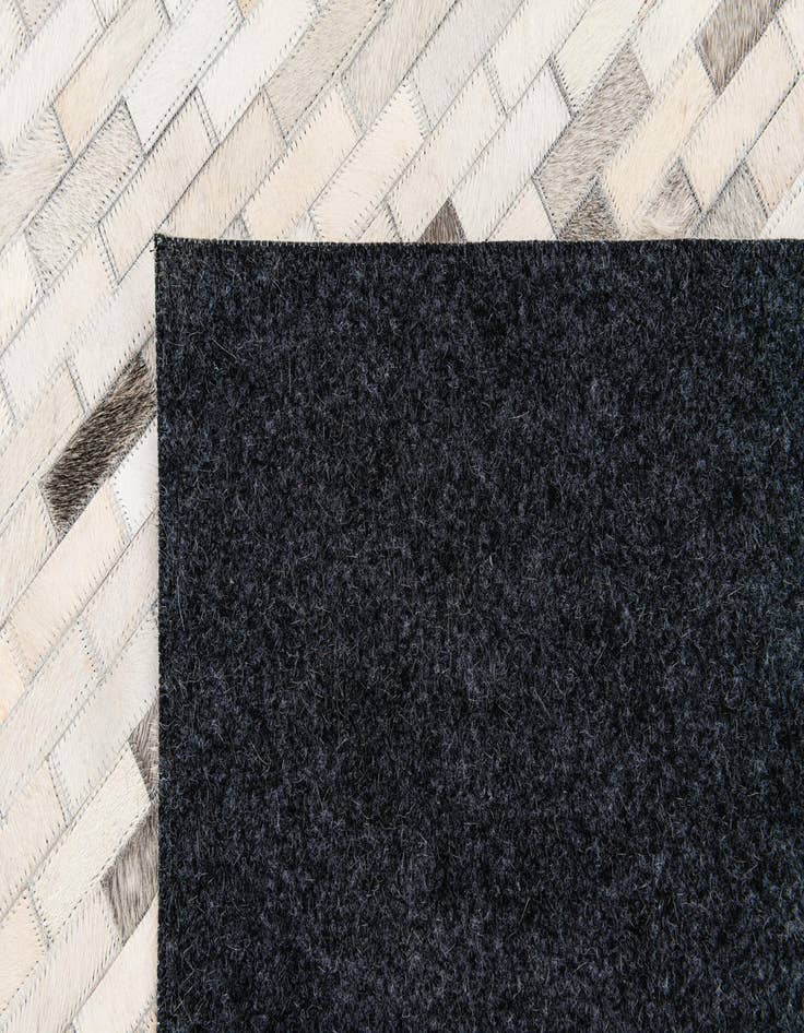Detail image of  5' 8 x 7' 10 Cowhide Stocks Rug