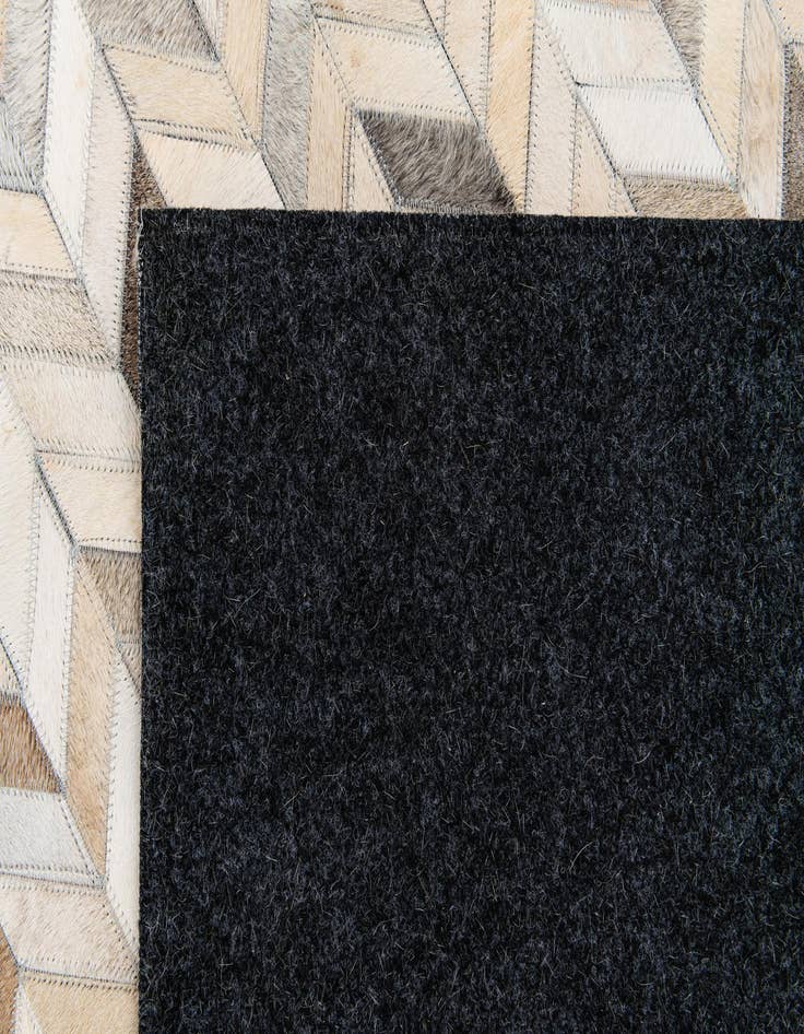 Detail image of  5' 9 x 7' 11 Cowhide Stocks Rug