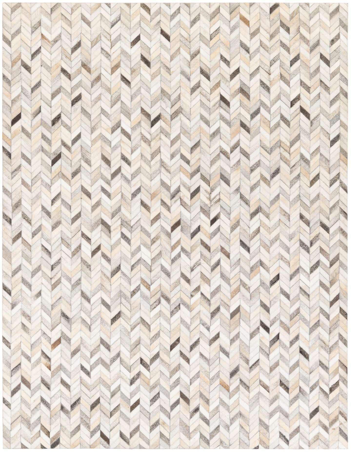 A 5x8 rectangular Cowhide Stocks rug from Rugs.com featuring a modern chevron pattern in multi-colored natural cowhide and leather.