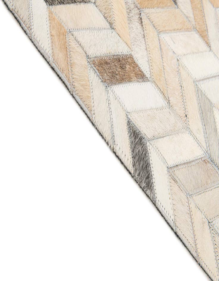 Detail image of  5' 7 x 7' 11 Cowhide Stocks Rug