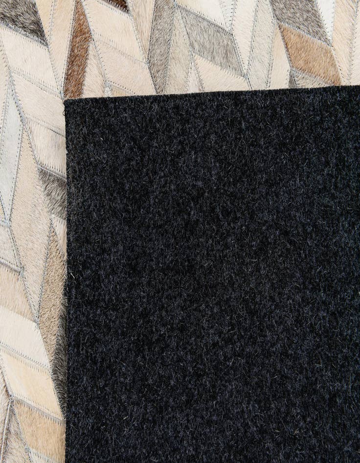 Detail image of  5' 7 x 7' 11 Cowhide Stocks Rug
