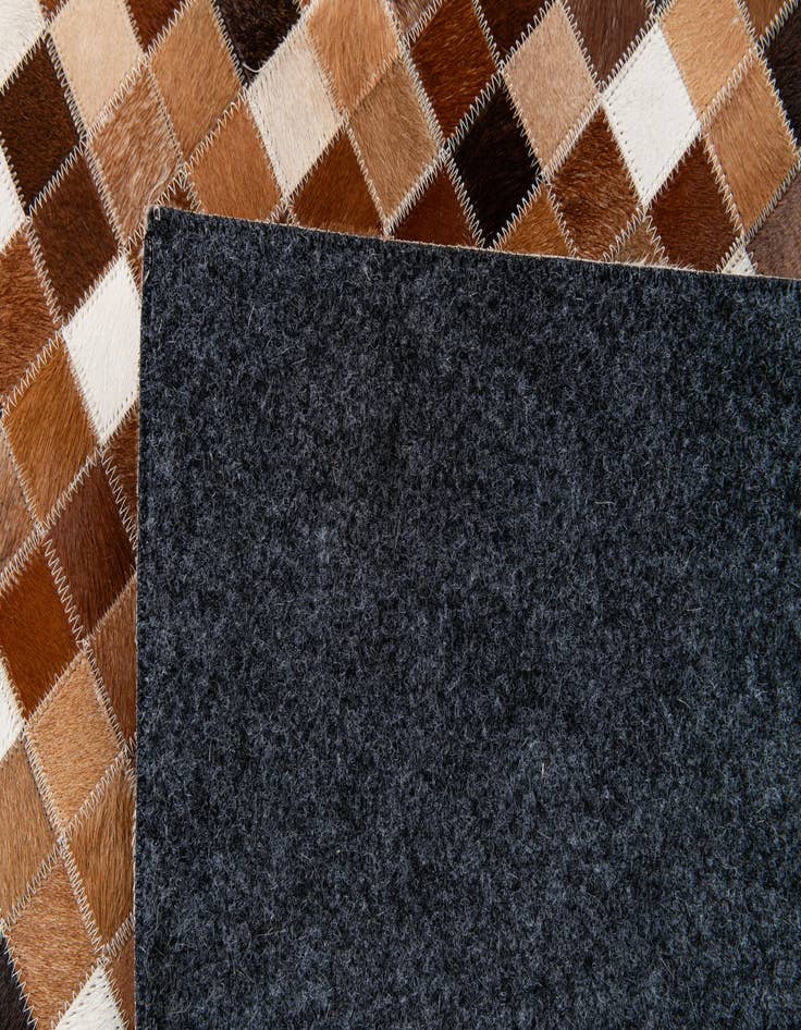 Detail image of  5' 9 x 8' Cowhide Stocks Rug