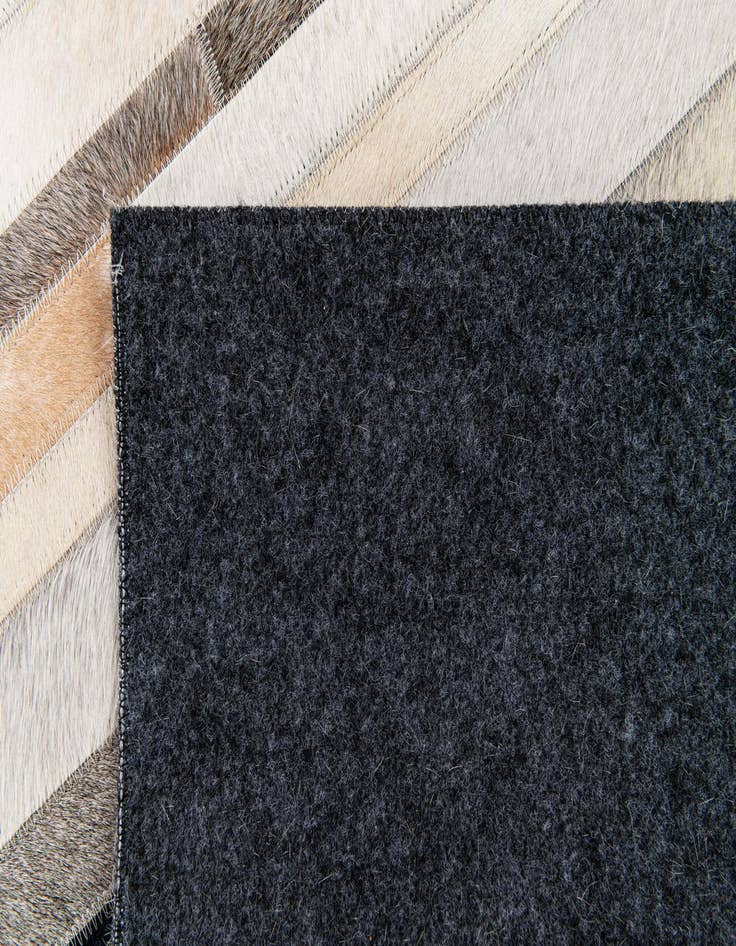 Detail image of  5' x 8' Cowhide Stocks Rug