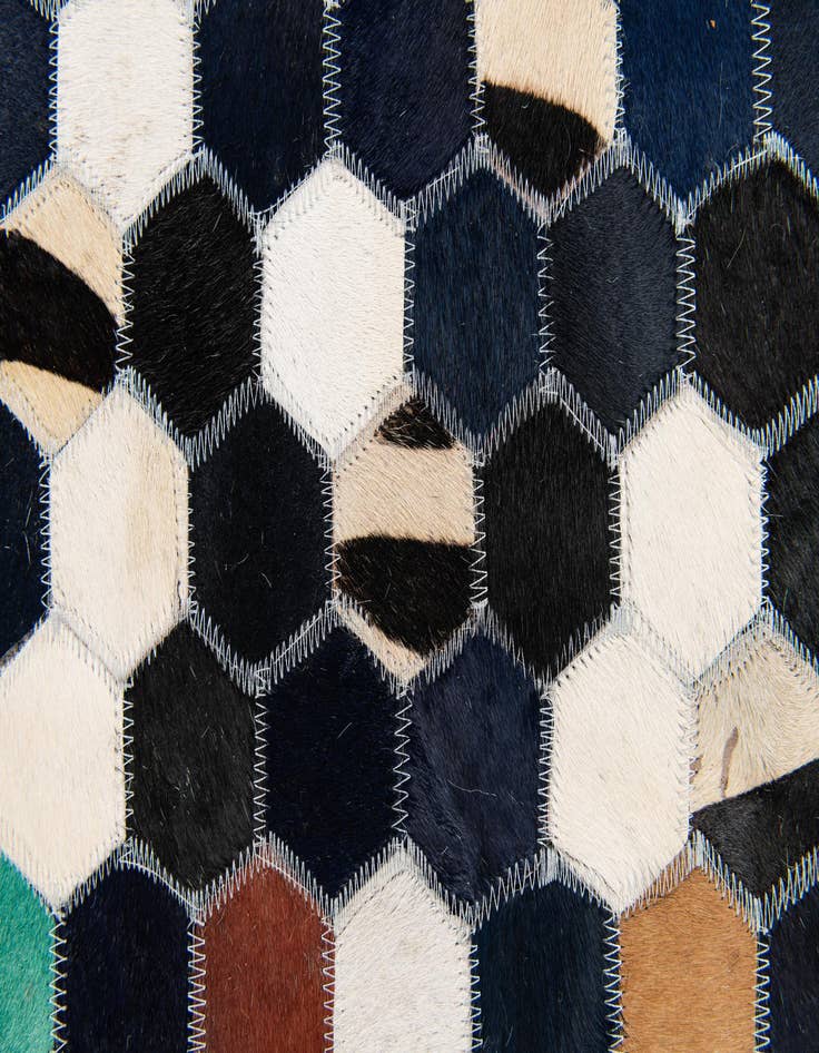 Detail image of  5' 1 x 8' Cowhide Stocks Rug