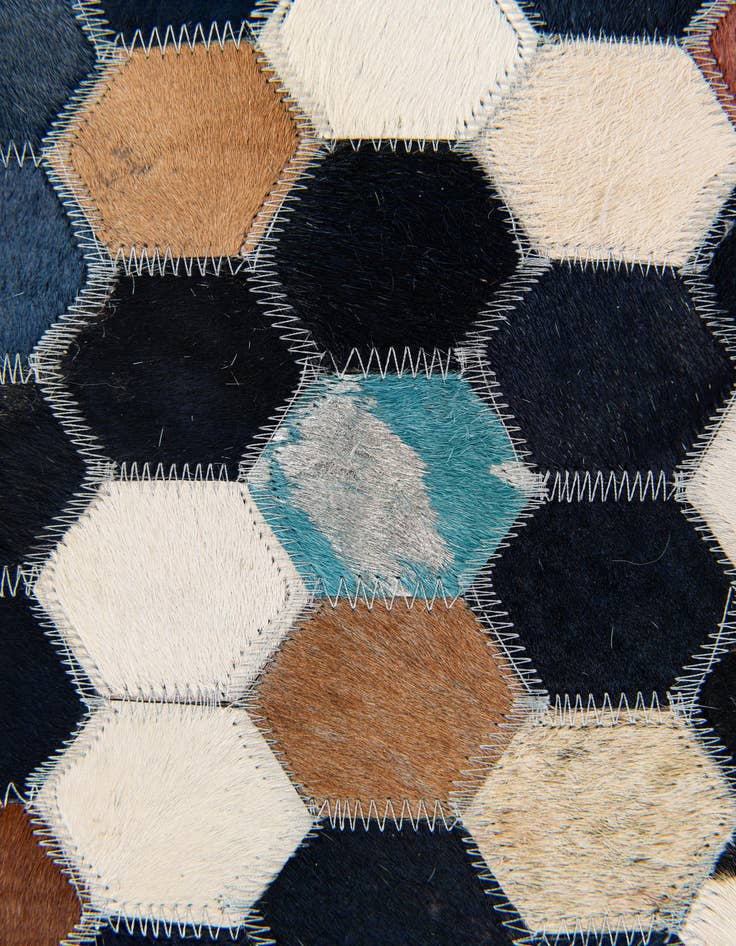 Detail image of  5' 1 x 8' Cowhide Stocks Rug