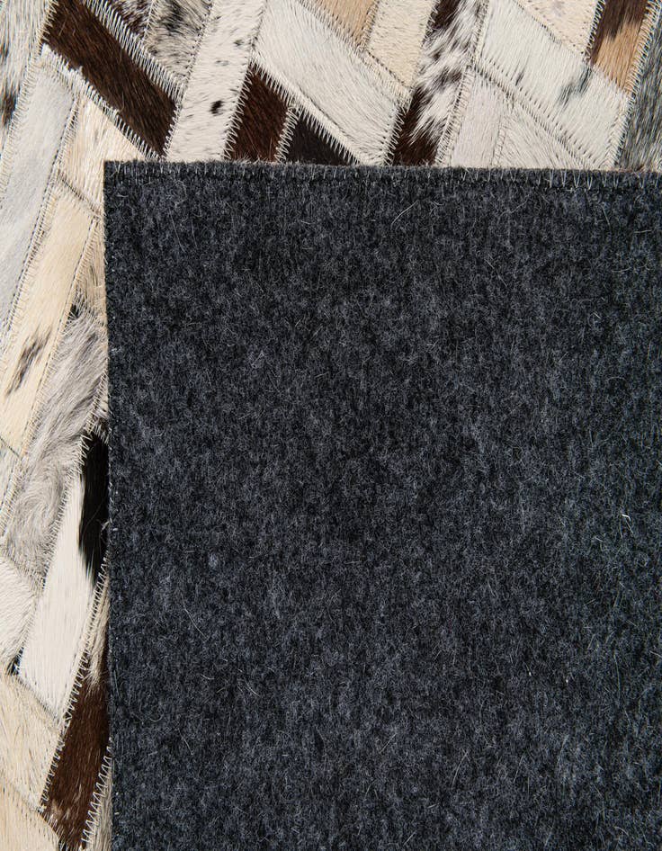 Detail image of  5' x 8' 1 Cowhide Stocks Rug