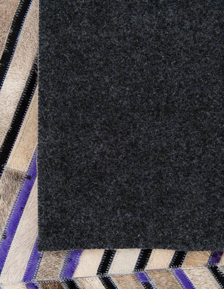Detail image of  5' x 7' 10 Cowhide Stocks Rug
