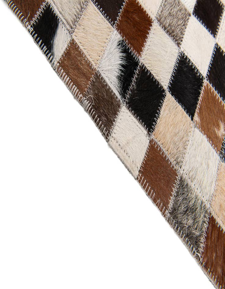 Detail image of  5' x 7' 9 Cowhide Stocks Rug