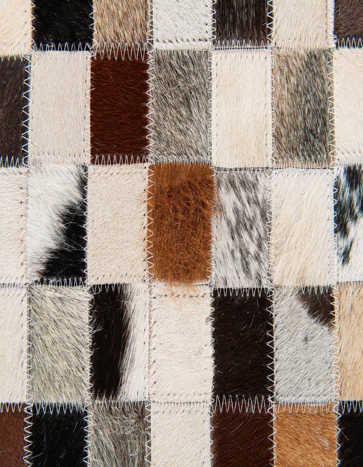 Detail image of  5' x 7' 9 Cowhide Stocks Rug