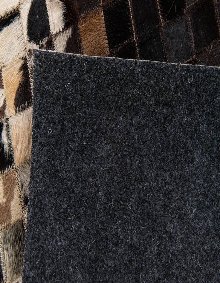 Detail image of  5' x 7' 10 Cowhide Stocks Rug