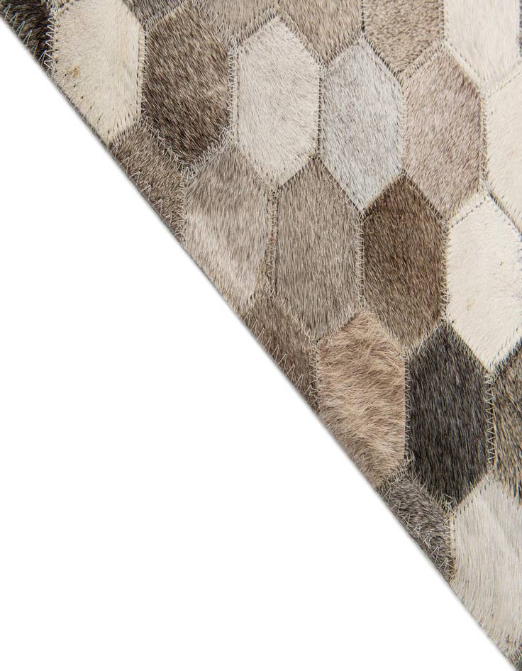 Detail image of  5' 1 x 8' Cowhide Stocks Rug
