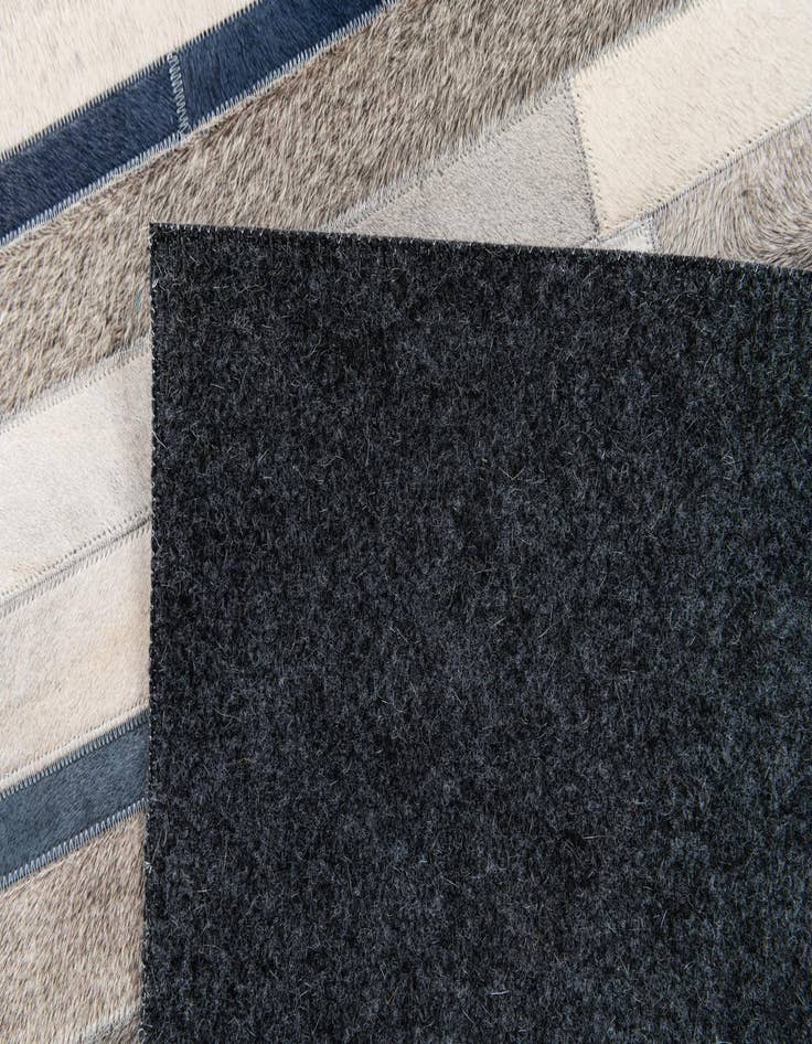 Detail image of  5' x 7' 10 Cowhide Stocks Rug