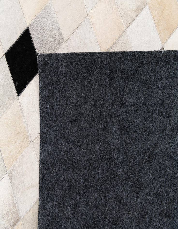 Detail image of  5' x 8' Cowhide Stocks Rug
