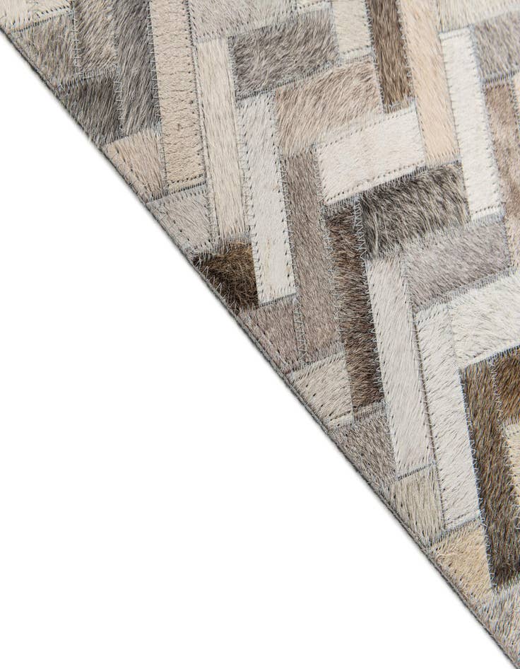Detail image of  5' x 7' 11 Cowhide Stocks Rug