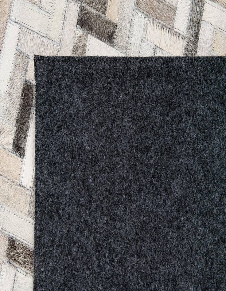 Detail image of  5' x 7' 11 Cowhide Stocks Rug