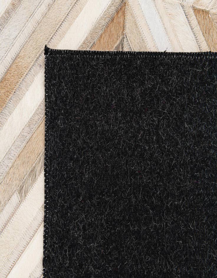 Detail image of  5' x 8' Cowhide Stocks Rug