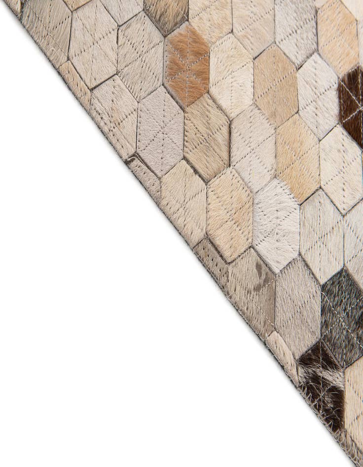 Detail image of  5' 4 x 7' 7 Cowhide Stocks Rug