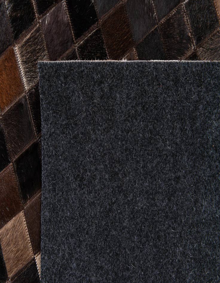 Detail image of  5' x 7' 10 Cowhide Stocks Rug