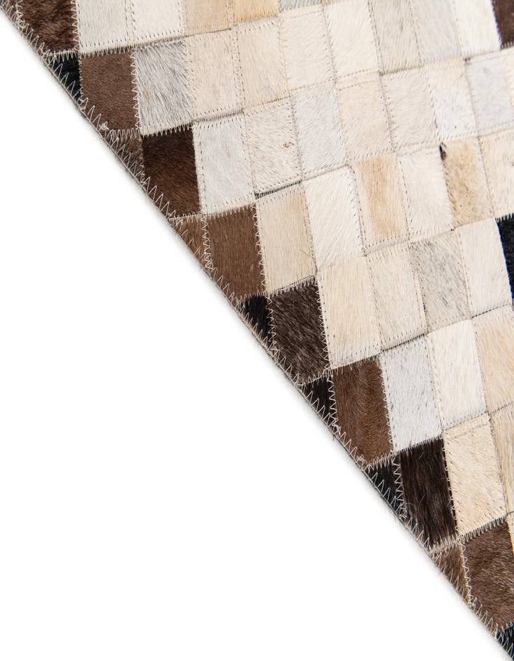 Detail image of  5' x 7' 10 Cowhide Stocks Rug