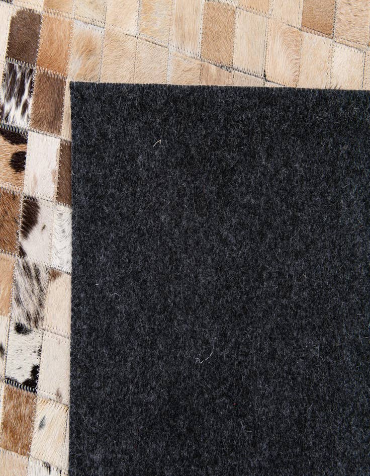 Detail image of  5' x 7' 10 Cowhide Stocks Rug