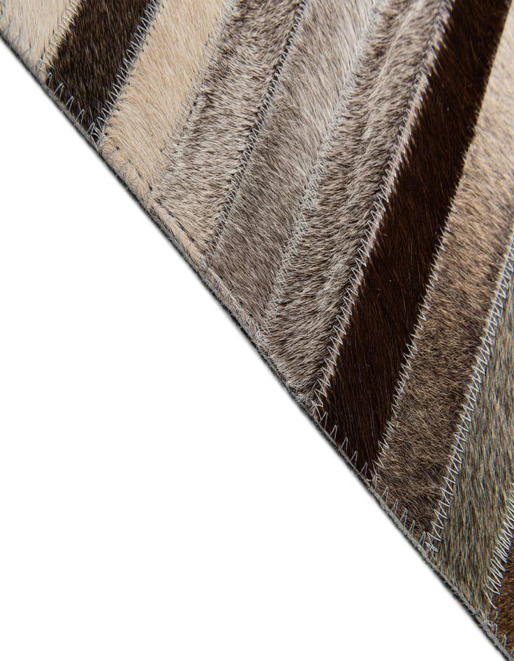Detail image of  5' 1 x 8' Cowhide Stocks Rug