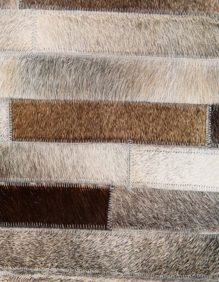 Detail image of  5' 1 x 8' Cowhide Stocks Rug