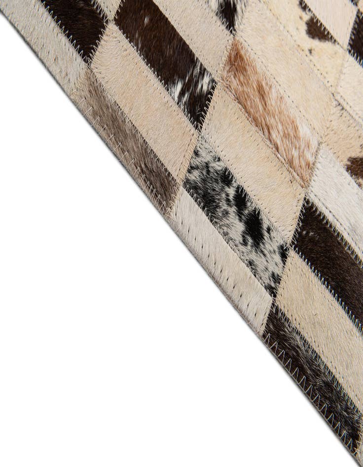 Detail image of  5' x 7' 9 Cowhide Stocks Rug