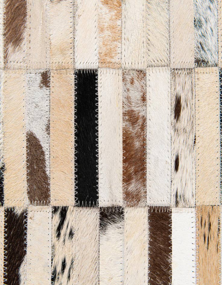 Detail image of  5' x 7' 9 Cowhide Stocks Rug