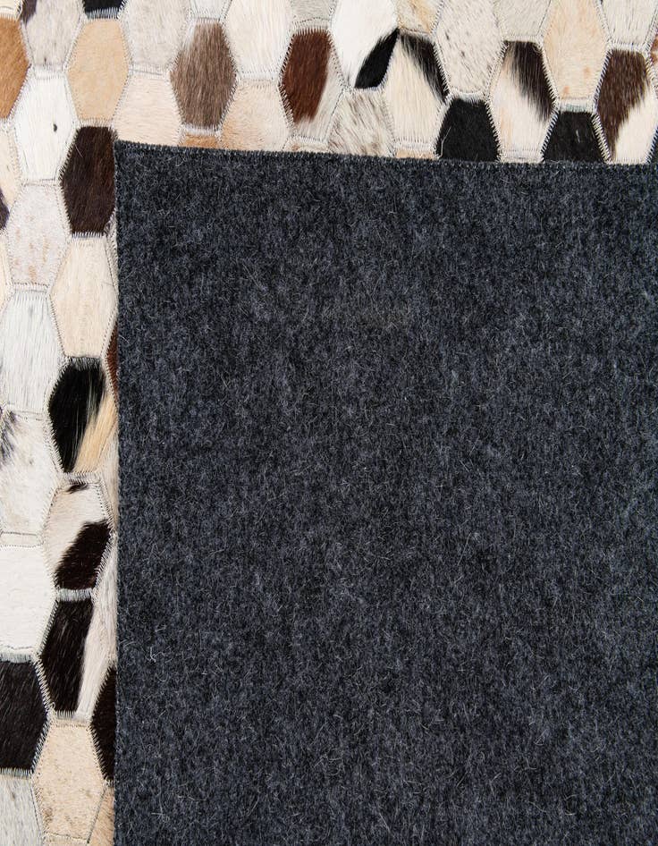 Detail image of  5' 11 x 8' Cowhide Stocks Rug