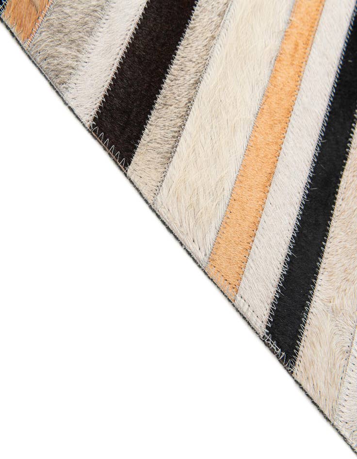 Detail image of  5' 1 x 7' 11 Cowhide Stocks Rug