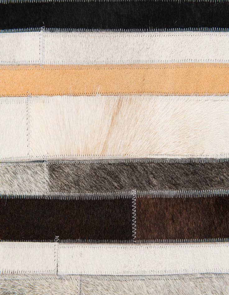 Detail image of  5' 1 x 7' 11 Cowhide Stocks Rug