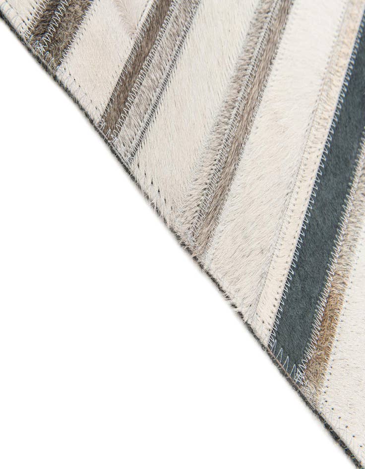 Detail image of  5' 1 x 7' 10 Cowhide Stocks Rug