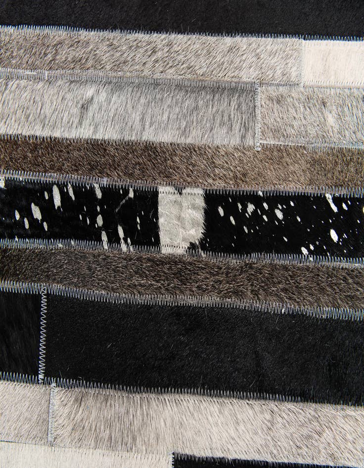 Detail image of  5' 1 x 7' 11 Cowhide Stocks Rug