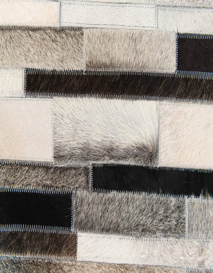 Detail image of  5' 1 x 7' 11 Cowhide Stocks Rug