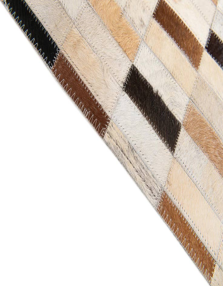 Detail image of  4' 11 x 7' 10 Cowhide Stocks Rug