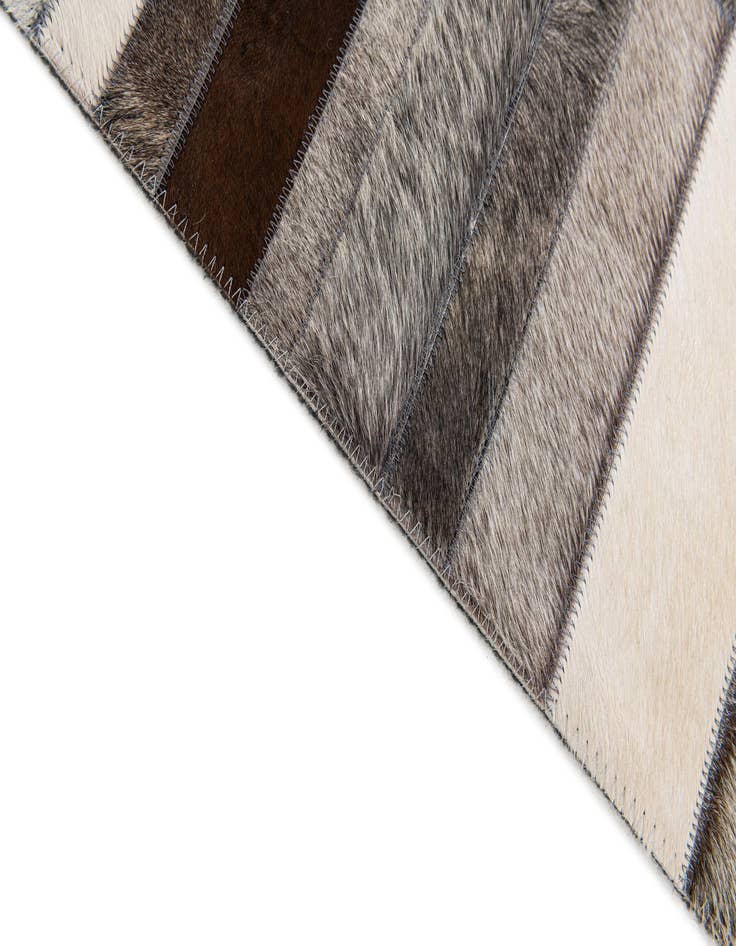 Detail image of  5' 1 x 8' Cowhide Stocks Rug