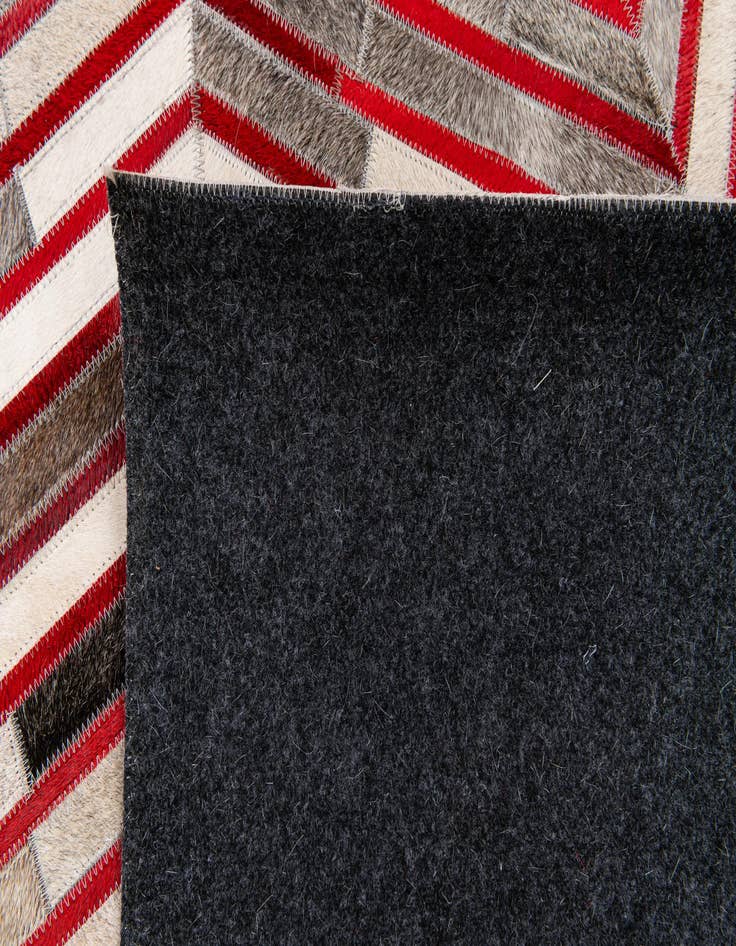 Detail image of  5' 1 x 7' 11 Cowhide Stocks Rug