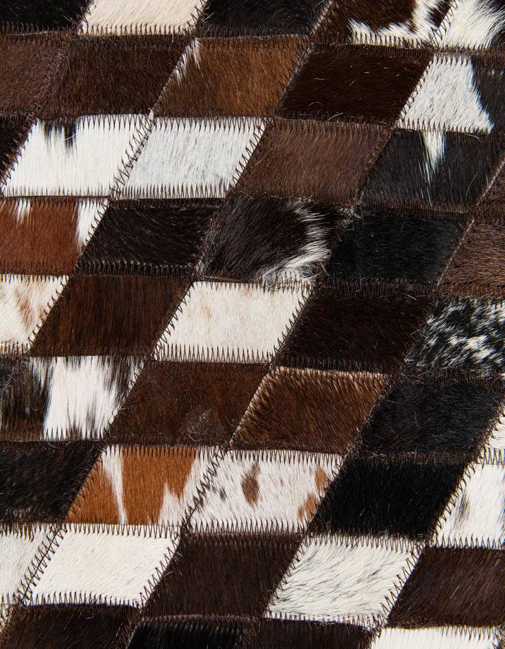 Detail image of  5' x 7' 11 Cowhide Stocks Rug