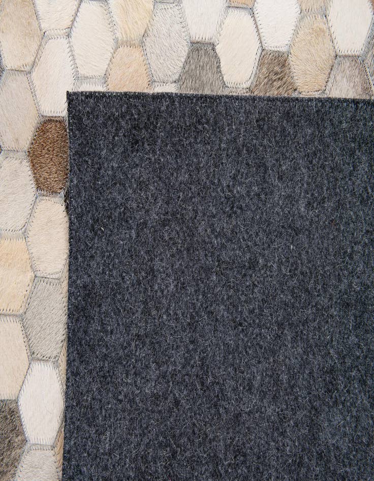 Detail image of  4' 11 x 7' 8 Cowhide Stocks Rug