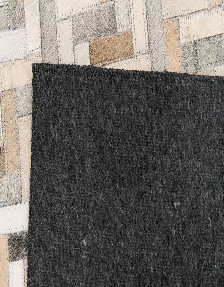 Detail image of  4' 10 x 7' 10 Cowhide Stocks Rug