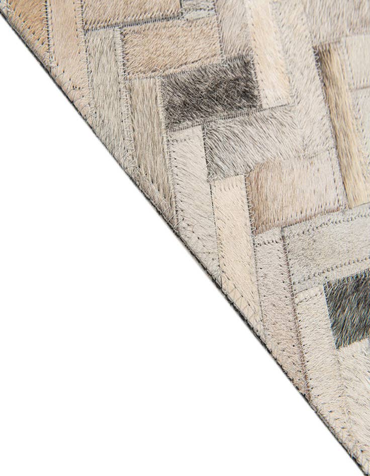 Detail image of  4' 10 x 7' 9 Cowhide Stocks Rug