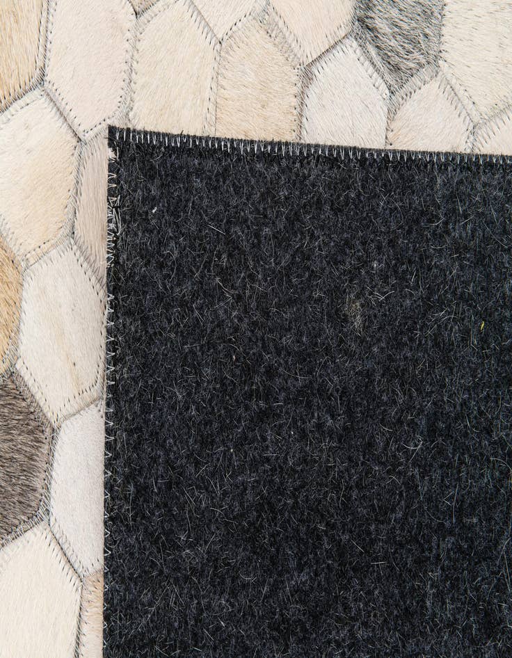 Detail image of  4' 9 x 7' 11 Cowhide Stocks Rug