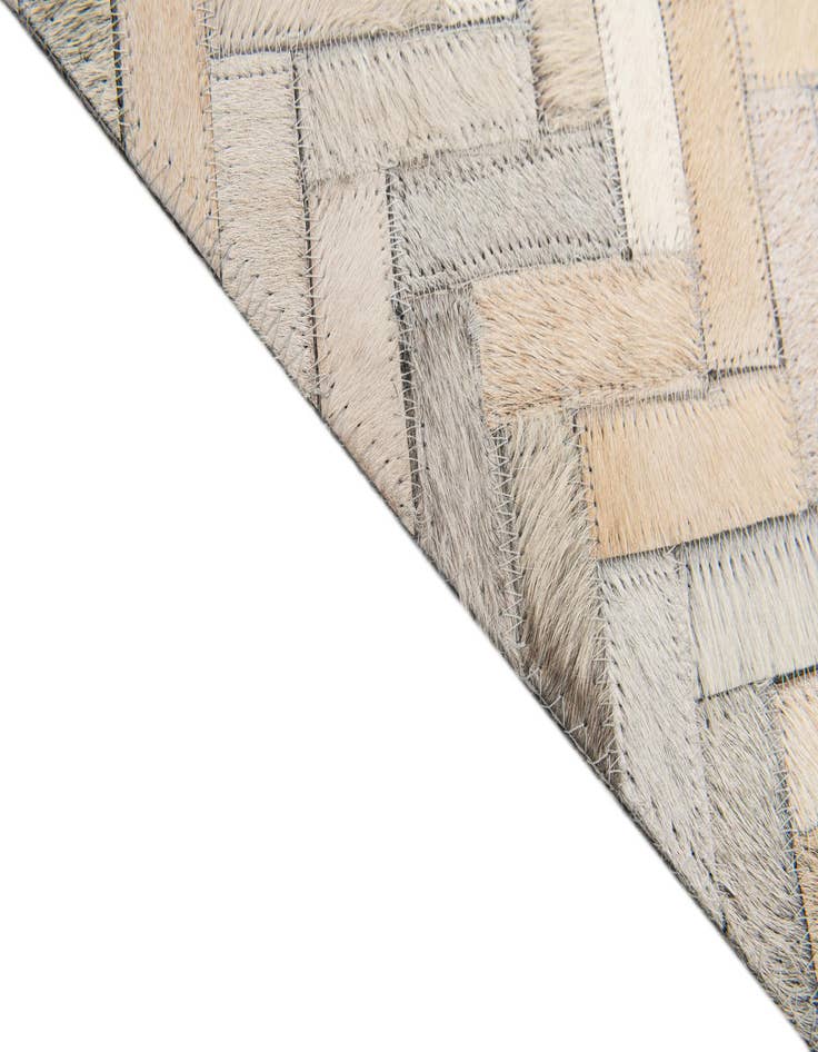 Detail image of  4' 10 x 7' 10 Cowhide Stocks Rug