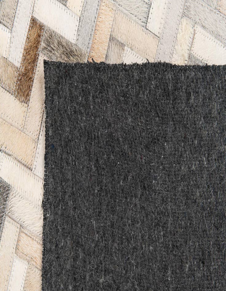 Detail image of  4' 10 x 7' 10 Cowhide Stocks Rug