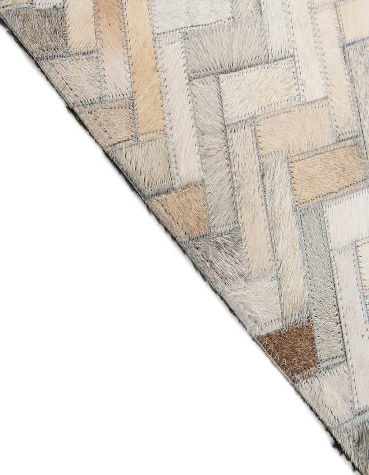 Detail image of  4' 10 x 7' 9 Cowhide Stocks Rug