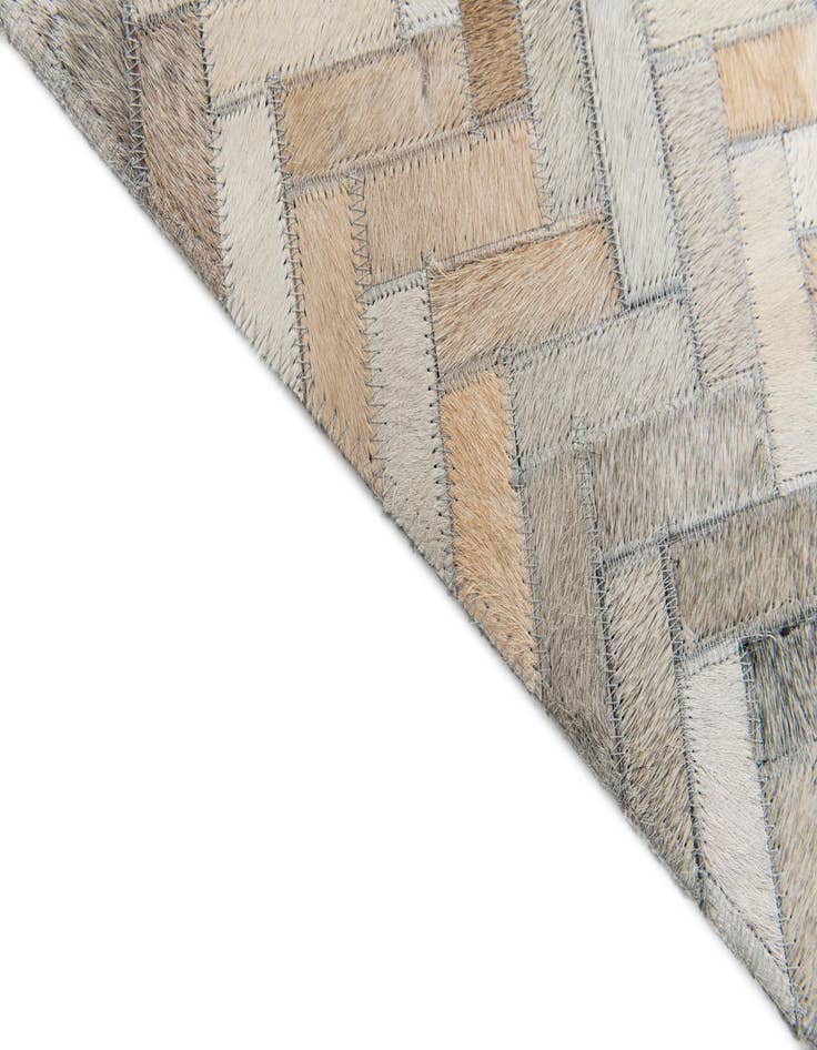 Detail image of  4' 10 x 7' 11 Cowhide Stocks Rug