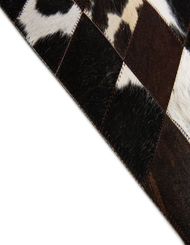Detail image of  5' x 7' 11 Cowhide Stocks Rug