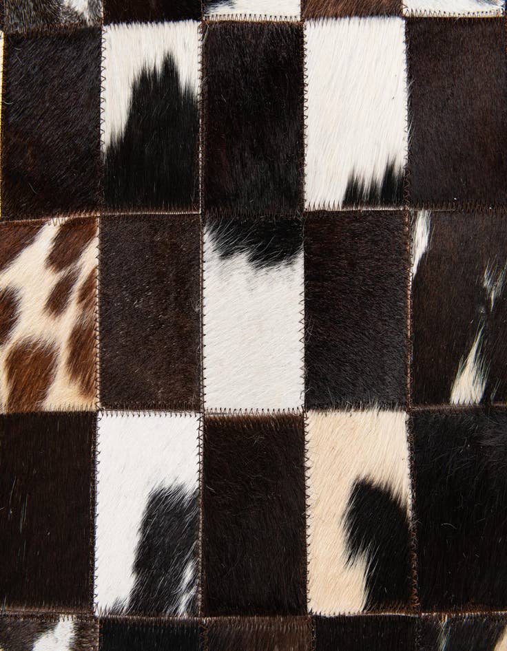 Detail image of  5' x 7' 11 Cowhide Stocks Rug