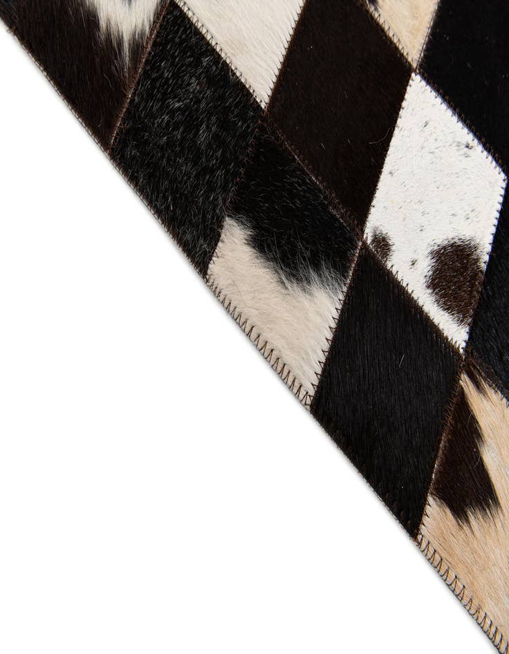Detail image of  5' x 7' 11 Cowhide Stocks Rug