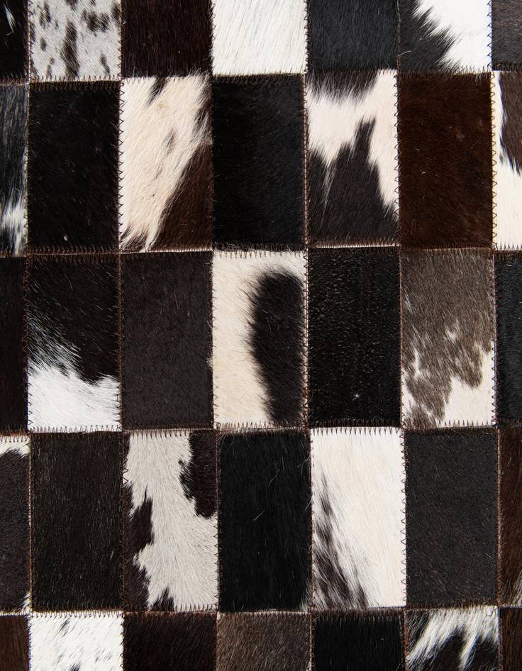 Detail image of  5' x 7' 11 Cowhide Stocks Rug